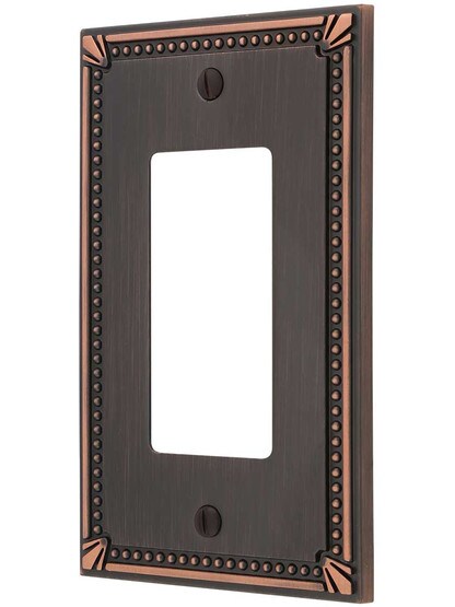 Imperial Bead Single GFI Cover Plate in Aged Bronze.